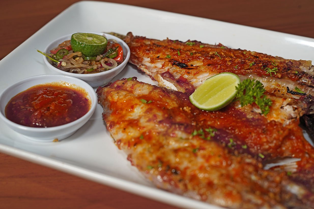 Fresh seafood selection at Warung Mufu in Kuta