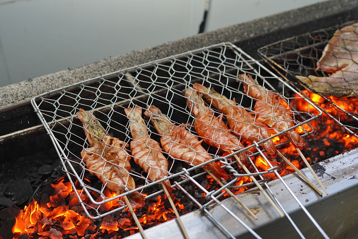Grilled seafood served with sambal in Tuban Kuta